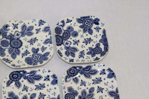 A SET OF SIX EXTREMELY RARE DUTCH MADE "SOCIETE CERAMIQUE MAASTRICHT" PORCELAIN TABLE SPOON RESTS