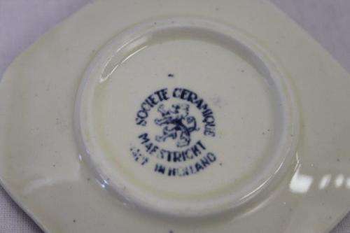 A SET OF SIX EXTREMELY RARE DUTCH MADE "SOCIETE CERAMIQUE MAASTRICHT" PORCELAIN TABLE SPOON RESTS