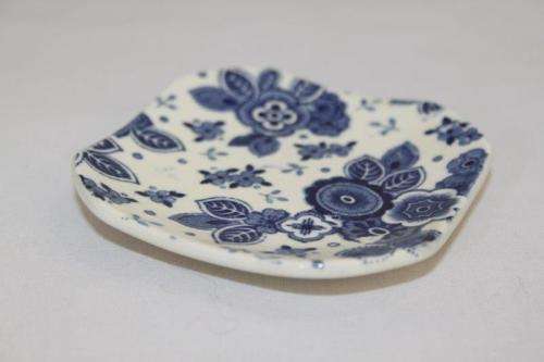 A SET OF SIX EXTREMELY RARE DUTCH MADE "SOCIETE CERAMIQUE MAASTRICHT" PORCELAIN TABLE SPOON RESTS