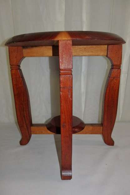 An awesome and solidly made Solid Teak four-legged stool in excellent condition RS17