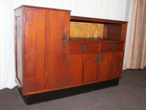 AN AMAZING ANTIQUE ART DECO SIDE SERVER WITH LOADS OF CUPBOARD SPACE AND A TIERED SERVING SURFACE