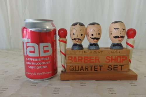 A FABULOUS VINTAGE "BARBER SHOP QUARTET" BAR ACCESSORY SET INCLUDING BOTTLE OPENER ETC