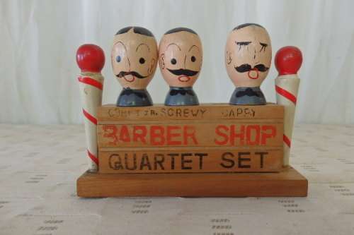 A FABULOUS VINTAGE "BARBER SHOP QUARTET" BAR ACCESSORY SET INCLUDING BOTTLE OPENER ETC