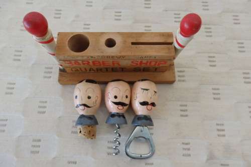 A FABULOUS VINTAGE "BARBER SHOP QUARTET" BAR ACCESSORY SET INCLUDING BOTTLE OPENER ETC