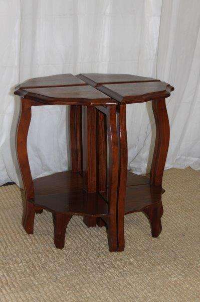 AN AWESOME SOLID TEAK COFFEE TABLE NEST WITH FOUR SMALLER TABLES MAKING A SINGLE LARGER ROUND TABLE
