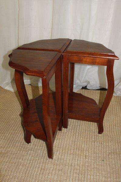 AN AWESOME SOLID TEAK COFFEE TABLE NEST WITH FOUR SMALLER TABLES MAKING A SINGLE LARGER ROUND TABLE