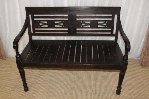 A FANTASTIC AND BEAUTIFULLY MADE CARVED INDONESIAN TEAK BENCH WITH STUNNING QUALITY CUSHIONS