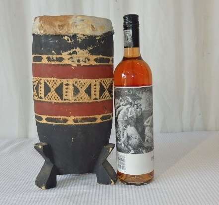 A STUNNING TRADITIONAL AFRICAN HAND CARVED HAND-DRUM WITH A HIDE SKIN TOP