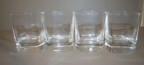 A GORGEOUS SET OF FOUR WHISKEY GLASSES WITH THICK HEAVY BASES IN GREAT CONDITION!!