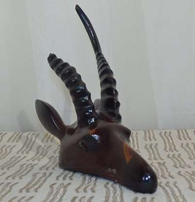 A STUNNING COLLECTION OF SIX WOODEN CARVED ANIMAL FIGURINES INCLUDING A STUNNING PAINTED ELEPHANT