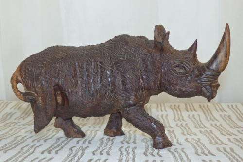 A STUNNING COLLECTION OF SIX WOODEN CARVED ANIMAL FIGURINES INCLUDING A STUNNING PAINTED ELEPHANT