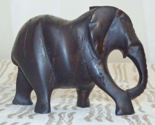 A STUNNING COLLECTION OF SIX WOODEN CARVED ANIMAL FIGURINES INCLUDING A STUNNING PAINTED ELEPHANT