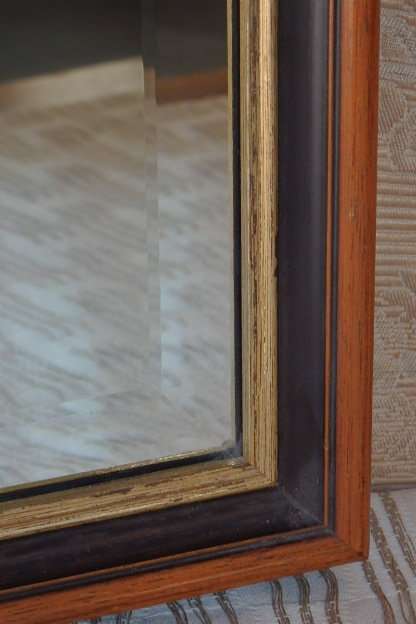 A BEAUTIFUL DARK WOODEN FRAMED BEVELED GLASS MIRROR WITH GOLD GILDING, GORGEOUS FOR ANY HOME