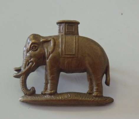 A STUNNING BRITISH "ROYAL GURKHA RIFLES" ROCK FORT (THE ELEPHANT DOG) ARM BADGE