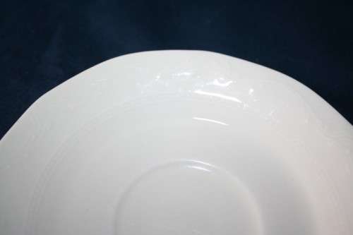 A WONDERFUL COLLECTION OF "HUGUENOT ROYALE" SAUCERS AND A PASTRY PLATTER