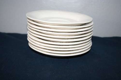 A WONDERFUL COLLECTION OF "HUGUENOT ROYALE" SAUCERS AND A PASTRY PLATTER