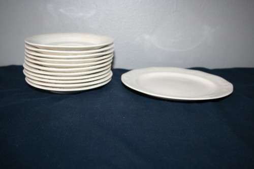 A WONDERFUL COLLECTION OF "HUGUENOT ROYALE" SAUCERS AND A PASTRY PLATTER