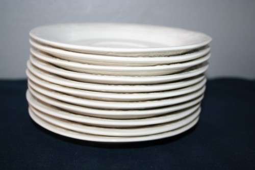 A WONDERFUL COLLECTION OF "HUGUENOT ROYALE" SAUCERS AND A PASTRY PLATTER