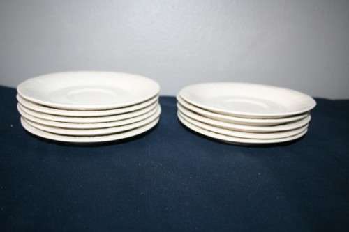 A WONDERFUL COLLECTION OF "HUGUENOT ROYALE" SAUCERS AND A PASTRY PLATTER