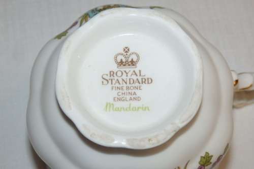 AN AWESOME ROYAL STANDARD "MANDARIN" PATTERN FINE BONE CHINA CUP AND SAUCER DUO