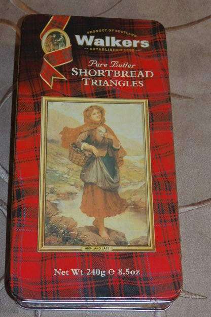 A FABULOUS COLLECTION OF SIX COLLECTABLE TINS INCLUDING A VINTAGE CADBURY'S TIN bid/tin