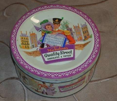A FABULOUS COLLECTION OF SIX COLLECTABLE TINS INCLUDING A VINTAGE CADBURY'S TIN bid/tin