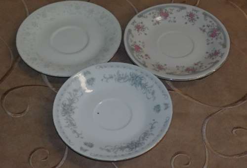 A LOVELY COLLECTION OF ELEVEN ASSORTED SAUCERS/ SMALL PLATES IN GOOD CONDITION - PERFECT FOR MOSAIC