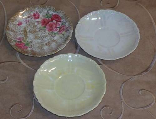 A LOVELY COLLECTION OF ELEVEN ASSORTED SAUCERS/ SMALL PLATES IN GOOD CONDITION - PERFECT FOR MOSAIC