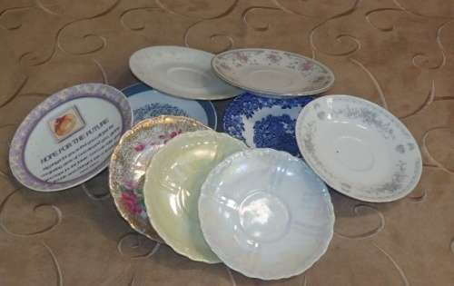 A LOVELY COLLECTION OF ELEVEN ASSORTED SAUCERS/ SMALL PLATES IN GOOD CONDITION - PERFECT FOR MOSAIC