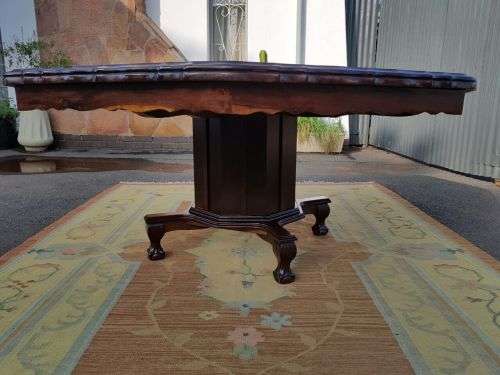 AN EXQUISITE LARGE ANTIQUE SOLID IMBUIA "OCTAGONAL" 8-SEATER (PEDESTAL) BALL AND CLAW DINING TABLE