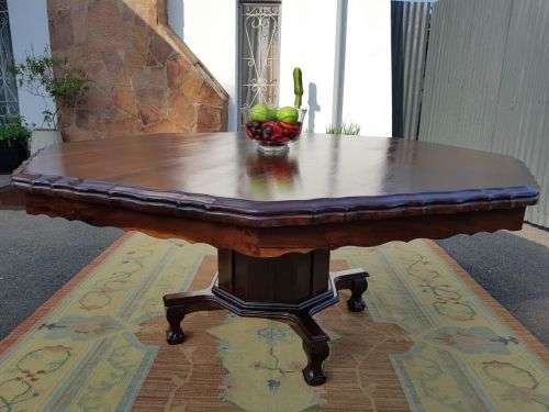 AN EXQUISITE LARGE ANTIQUE SOLID IMBUIA "OCTAGONAL" 8-SEATER (PEDESTAL) BALL AND CLAW DINING TABLE