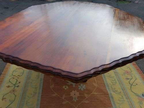 AN EXQUISITE LARGE ANTIQUE SOLID IMBUIA "OCTAGONAL" 8-SEATER (PEDESTAL) BALL AND CLAW DINING TABLE