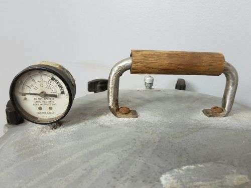 TWO INCREDIBLE ANTIQUE (LARGE) PRESSURE COOKERS WITH BAKELITE TIGHTENERS bid/cooker