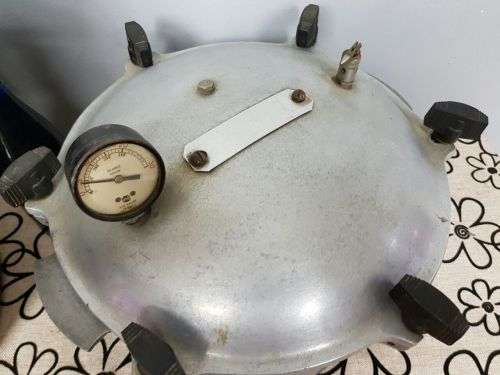 TWO INCREDIBLE ANTIQUE (LARGE) PRESSURE COOKERS WITH BAKELITE TIGHTENERS bid/cooker