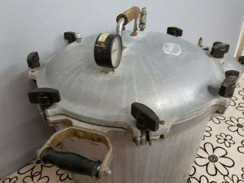 TWO INCREDIBLE ANTIQUE (LARGE) PRESSURE COOKERS WITH BAKELITE TIGHTENERS bid/cooker