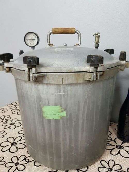 TWO INCREDIBLE ANTIQUE (LARGE) PRESSURE COOKERS WITH BAKELITE TIGHTENERS bid/cooker