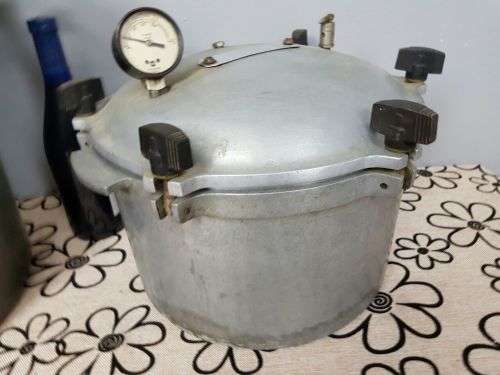 TWO INCREDIBLE ANTIQUE (LARGE) PRESSURE COOKERS WITH BAKELITE TIGHTENERS bid/cooker
