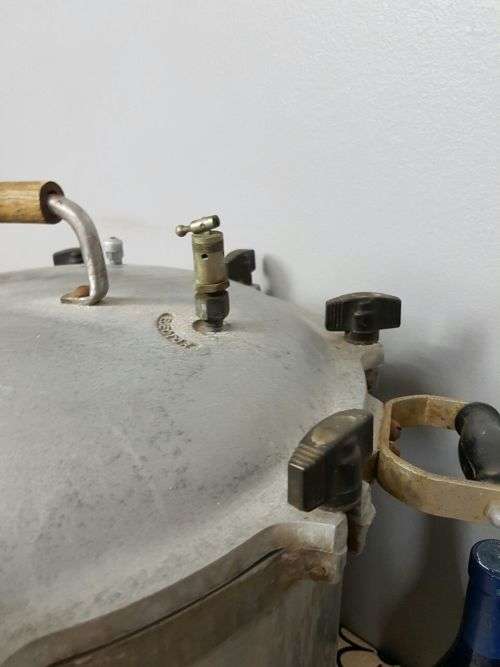 TWO INCREDIBLE ANTIQUE (LARGE) PRESSURE COOKERS WITH BAKELITE TIGHTENERS bid/cooker