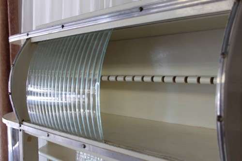 AN INCREDIBLE VINTAGE KITCHEN CUPBOARD WITH CURVED GLASS PANELS AND LOADS OF SPACE
