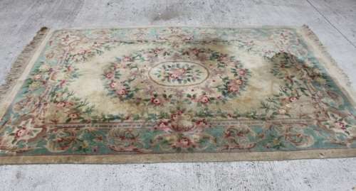 A WONDERFUL ANTIQUE PURE WOOL PILE CARPET (2.9m x 1.8m) WITH GREENS, PINKS, TANS AND EARTHY TONES