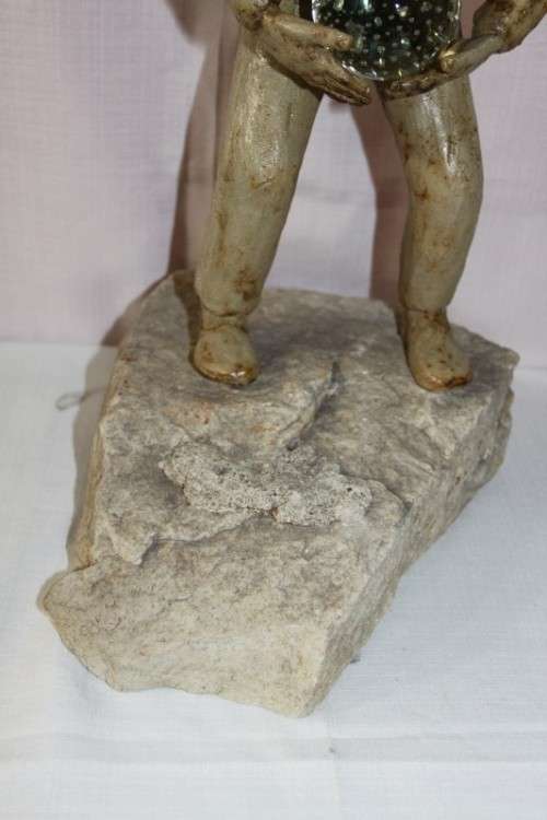 A SUPERB LARGE ONE-OF-A-KIND HAND SCULPTED STONEWARE "MAN" SCULPTURE HOLDING A GLASS BALL