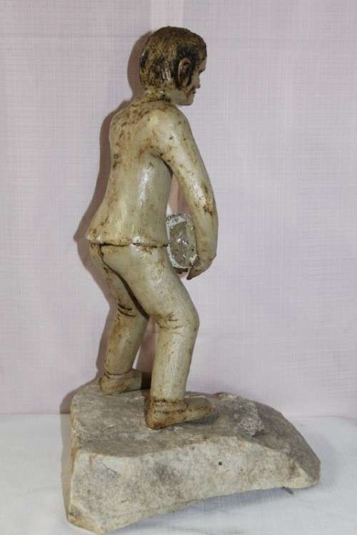 A SUPERB LARGE ONE-OF-A-KIND HAND SCULPTED STONEWARE "MAN" SCULPTURE HOLDING A GLASS BALL