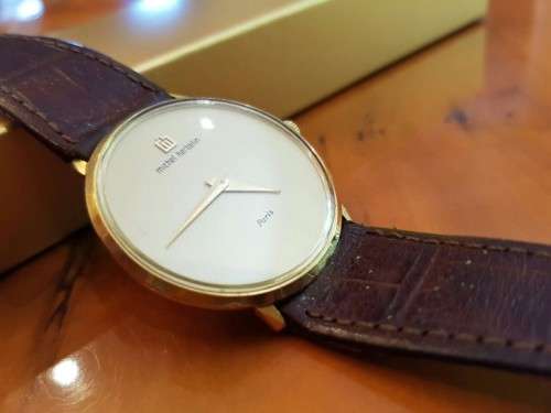 A BEAUTIFUL VINTAGE MICHEL HERBELIN (MODEL 2614) GOLD PLATED GENTS SLIMLINE DRESS WATCH