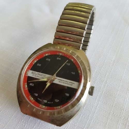 A FANTASTIC METAL "ROLOMATIC" 17 JEWEL WATERPROOF GENTS WRIST WATCH WITH A SWISS MOVEMENT