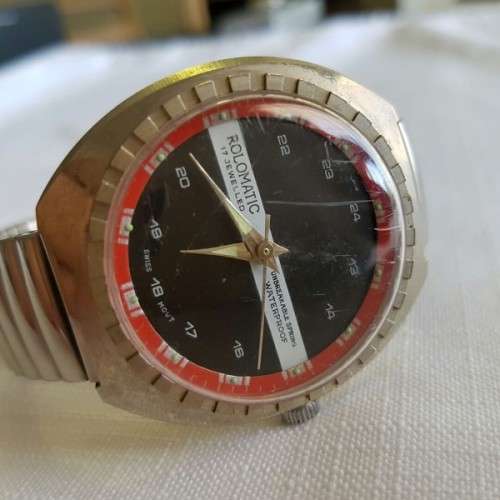A FANTASTIC METAL "ROLOMATIC" 17 JEWEL WATERPROOF GENTS WRIST WATCH WITH A SWISS MOVEMENT