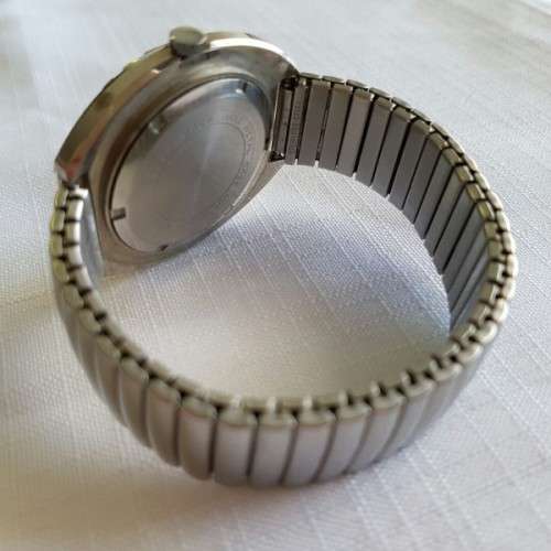 A FANTASTIC METAL "ROLOMATIC" 17 JEWEL WATERPROOF GENTS WRIST WATCH WITH A SWISS MOVEMENT