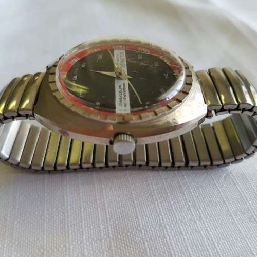 A FANTASTIC METAL "ROLOMATIC" 17 JEWEL WATERPROOF GENTS WRIST WATCH WITH A SWISS MOVEMENT