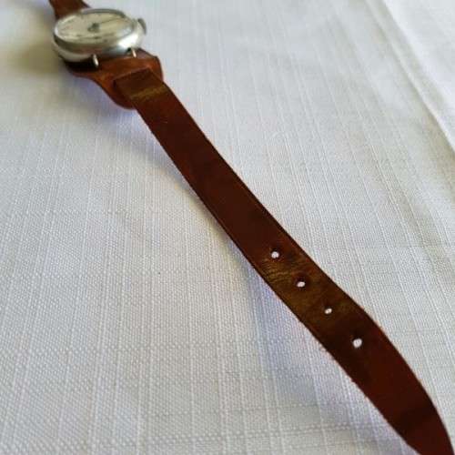 A WONDERFUL ANTIQUE (cWW1) ENGLISH MADE "ESCORT" GENTS STEEL TRENCH WATCH WITH A NEW LEATHER STRAP