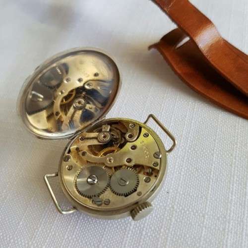 A WONDERFUL ANTIQUE (cWW1) ENGLISH MADE "ESCORT" GENTS STEEL TRENCH WATCH WITH A NEW LEATHER STRAP