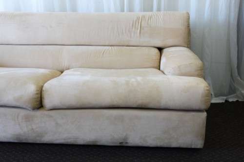 AN AWESOME TAN SUEDE FEEL LARGE 2-SEATER COMFORTABLE COUCH IN AWESOME CONDITION